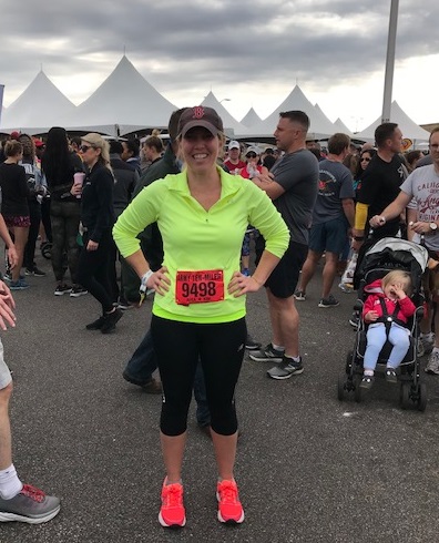 Jill Burnie standing in the finisher's village at the Army Ten Miler